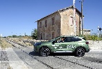 https://www.ragusanews.com/immagini_articoli/13-06-2024/ford-kuga-hybrid-180-cavalli-2500-benzina-elettrico-il-suv-da-24-al-litro-100.jpg